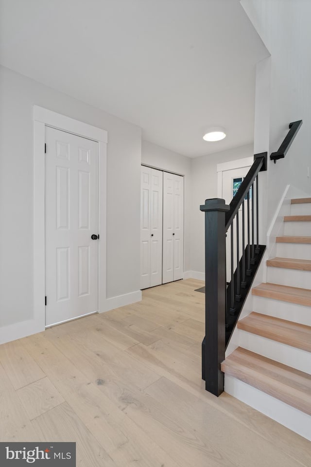 3838 13th St N, Arlington, VA 22201 - stairway with wood finished floors and baseboards