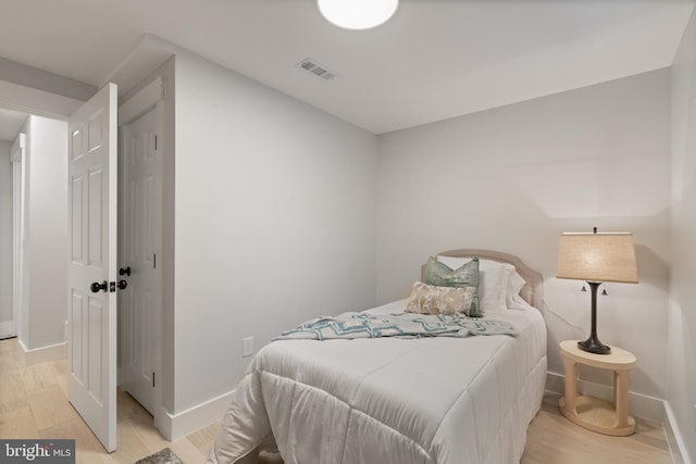 3838 13th St N, Arlington, VA 22201 - bedroom with baseboards and light wood-style flooring