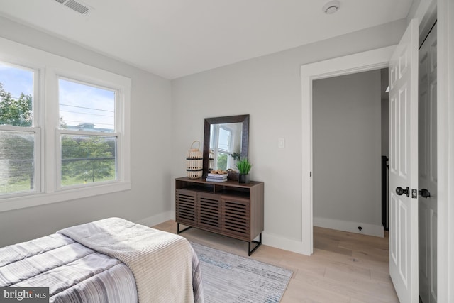 3838 13th St N, Arlington, VA 22201 - bedroom with light wood-type flooring and baseboards