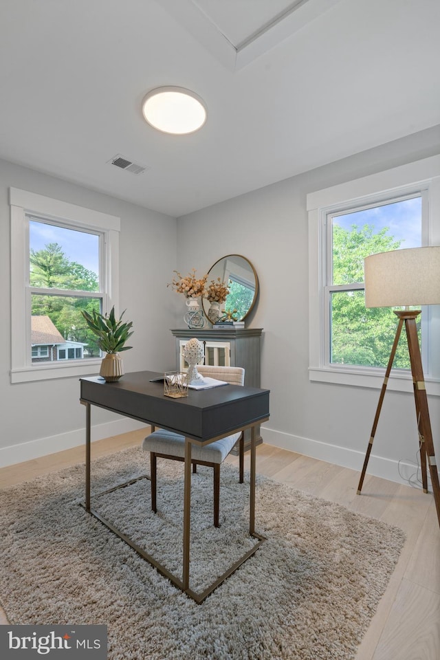 3838 13th St N, Arlington, VA 22201 - home office featuring healthy amount of natural light, light wood-type flooring, and baseboards