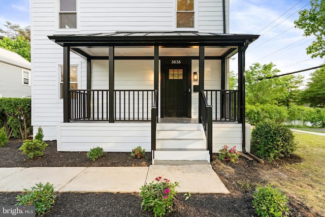 3838 13th St N, Arlington, VA 22201 - doorway to property featuring a porch