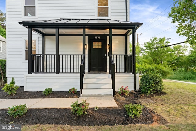 3838 13th St N, Arlington, VA 22201 - view of front of property with a standing seam roof, covered porch, and metal roof