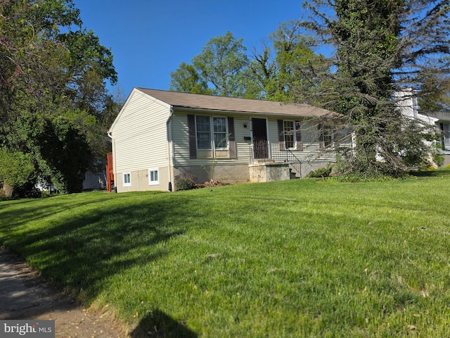 ranch-style house with a front yard