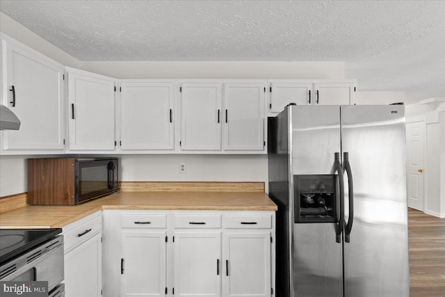 5127 Beaugregory Ct, Waldorf, MD 20603 - kitchen with a textured ceiling, white cabinets, black microwave, light countertops, and stainless steel refrigerator with ice dispenser