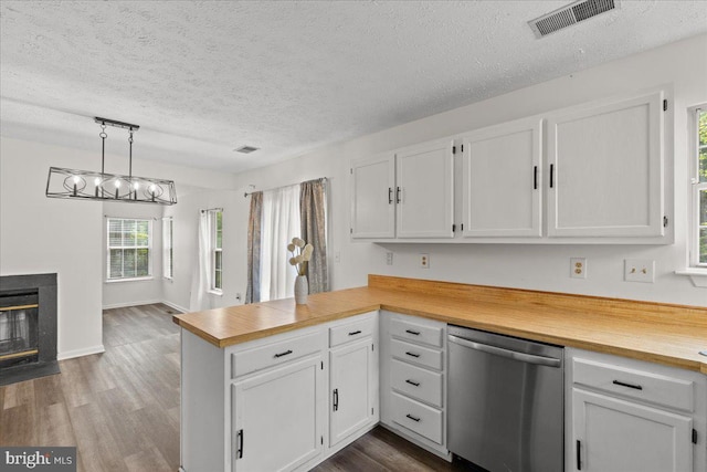 5127 Beaugregory Ct, Waldorf, MD 20603 - kitchen featuring visible vents, a peninsula, dishwasher, and white cabinetry