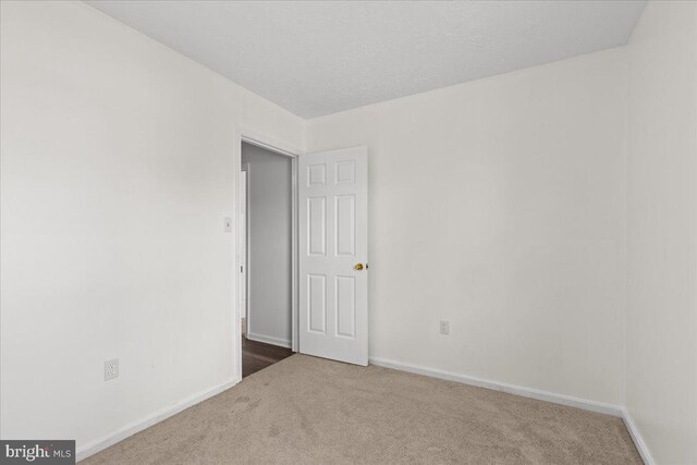 5127 Beaugregory Ct, Waldorf, MD 20603 - carpeted spare room featuring baseboards