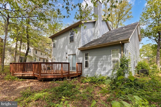 5127 Beaugregory Ct, Waldorf, MD 20603 - back of house with a wooden deck, central AC unit, and a chimney