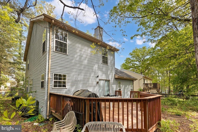 5127 Beaugregory Ct, Waldorf, MD 20603 - back of house with a deck and a chimney