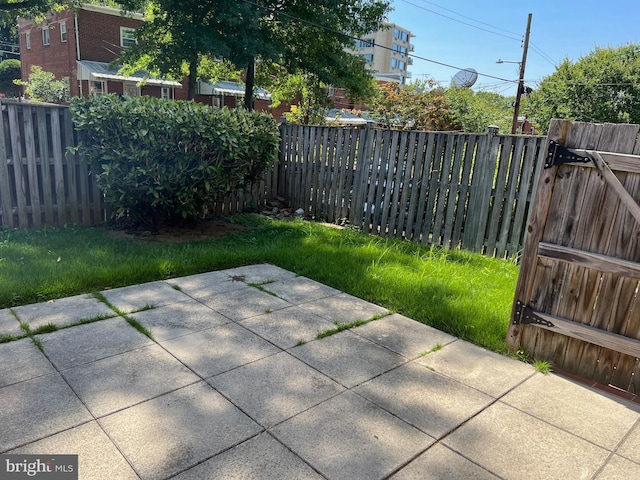 exterior space featuring a fenced backyard and a patio area