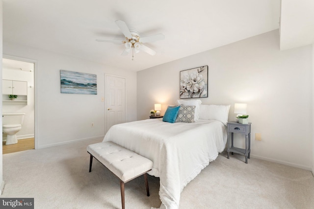9552 Cannoneer Ct Unit 204, Manassas, VA 20110 - bedroom featuring light colored carpet, baseboards, ensuite bathroom, and a ceiling fan
