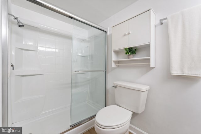 9552 Cannoneer Ct Unit 204, Manassas, VA 20110 - full bathroom with toilet, a stall shower, and baseboards