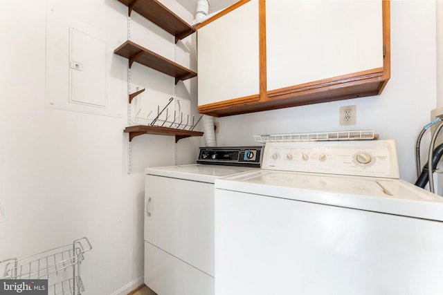 9552 Cannoneer Ct Unit 204, Manassas, VA 20110 - clothes washing area with cabinet space, washer and clothes dryer, electric panel, and baseboards