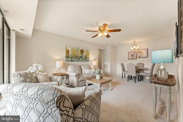 9552 Cannoneer Ct Unit 204, Manassas, VA 20110 - carpeted living area featuring a ceiling fan and a chandelier