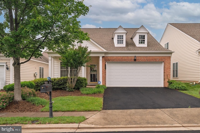 20449 Rosses Point Ct, Ashburn, VA 20147 - view of front facade featuring brick siding, a garage, asphalt driveway, and roof with shingles
