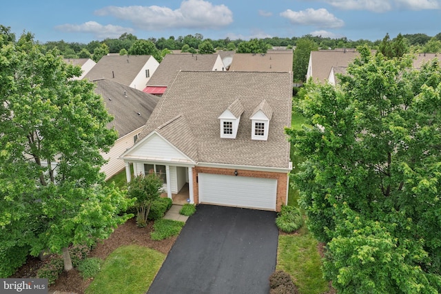 20449 Rosses Point Ct, Ashburn, VA 20147 - view of front of home featuring a shingled roof, brick siding, and driveway