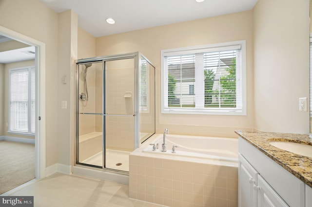 20449 Rosses Point Ct, Ashburn, VA 20147 - full bath with vanity, a bath, a stall shower, and tile patterned flooring