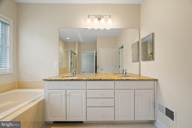 20449 Rosses Point Ct, Ashburn, VA 20147 - full bathroom with double vanity, a stall shower, a bath, and healthy amount of natural light