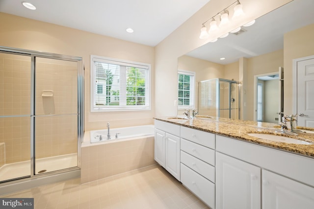 20449 Rosses Point Ct, Ashburn, VA 20147 - bathroom with a stall shower, double vanity, a bath, tile patterned floors, and recessed lighting