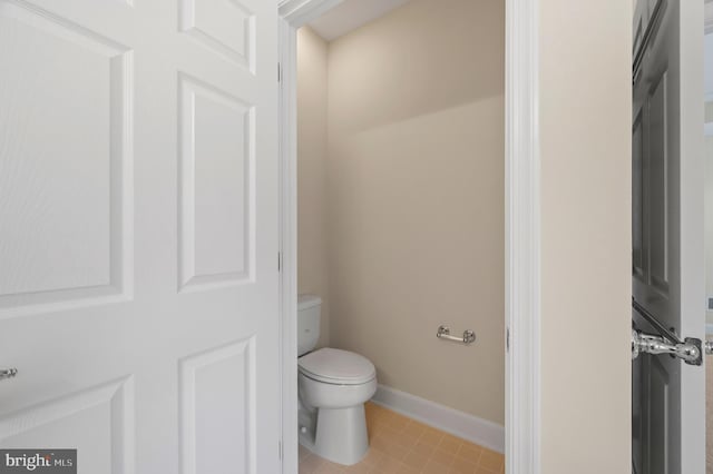 20449 Rosses Point Ct, Ashburn, VA 20147 - bathroom with toilet and baseboards