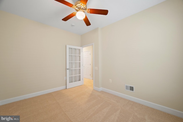 20449 Rosses Point Ct, Ashburn, VA 20147 - carpeted empty room featuring french doors, a smoke detector, and a ceiling fan