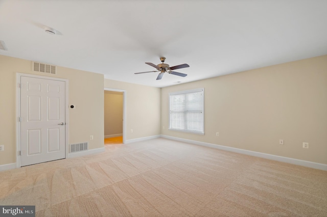 20449 Rosses Point Ct, Ashburn, VA 20147 - spare room featuring a ceiling fan, light carpet, and a smoke detector