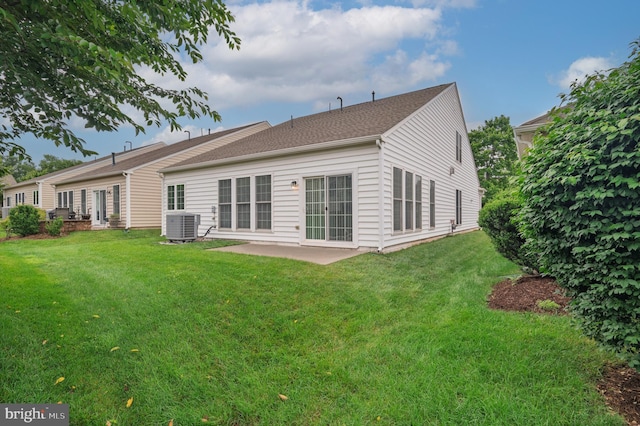 20449 Rosses Point Ct, Ashburn, VA 20147 - back of house with a patio and a lawn