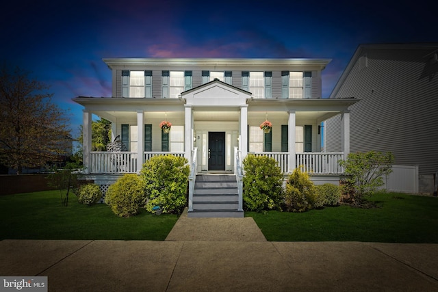 3 Union St, Robbinsville, NJ 08691 - view of front facade with covered porch and a front lawn