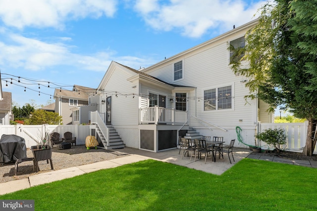 3 Union St, Robbinsville, NJ 08691 - rear view of property featuring a patio, a fenced backyard, an outdoor fire pit, a yard, and stairway