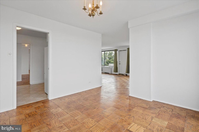 4501 Arlington Blvd Unit 709, Arlington, VA 22203 - spare room featuring a chandelier