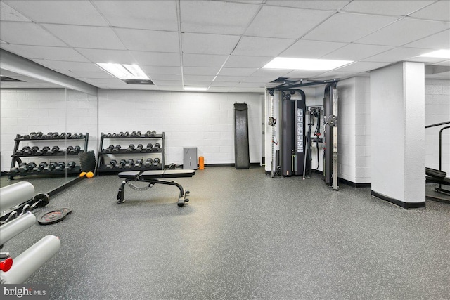 4501 Arlington Blvd Unit 709, Arlington, VA 22203 - exercise room with concrete block wall, a drop ceiling, and baseboards