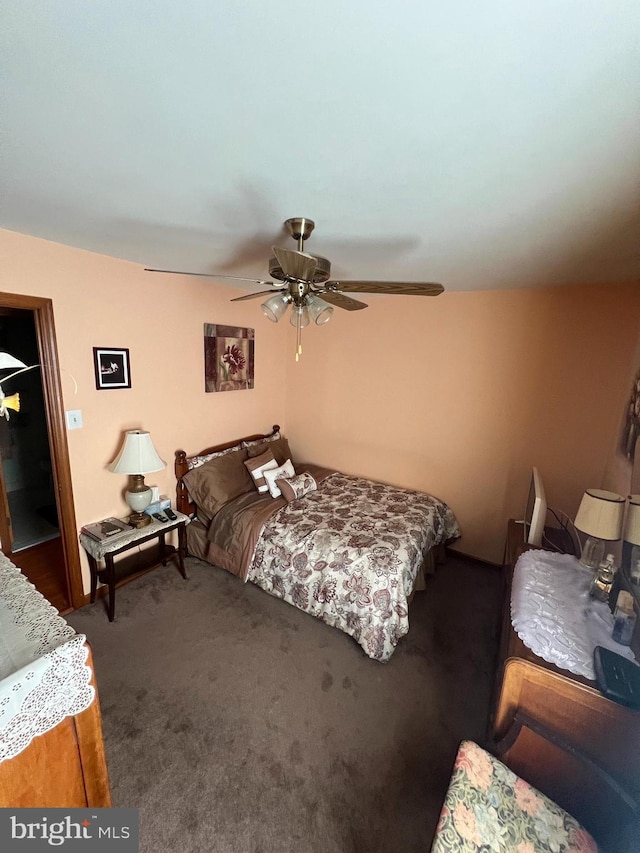 carpeted bedroom featuring a ceiling fan