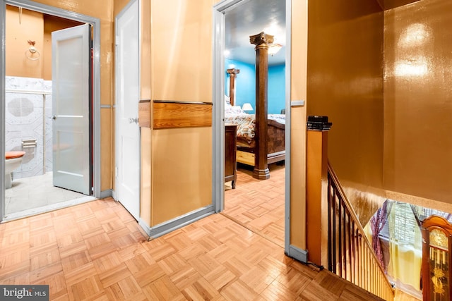 corridor featuring an upstairs landing