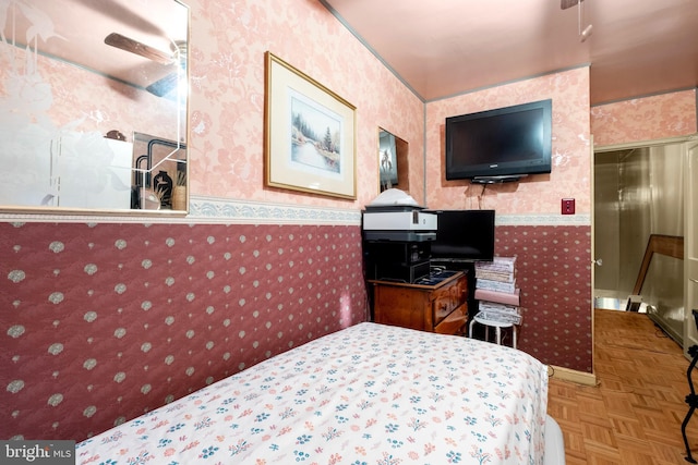 bedroom featuring wallpapered walls