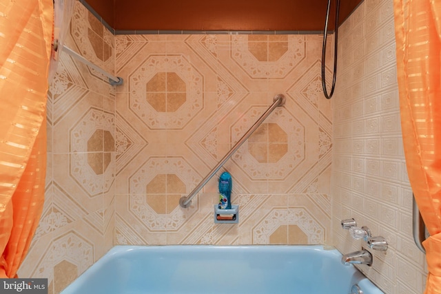 room details featuring shower / bath combination with curtain