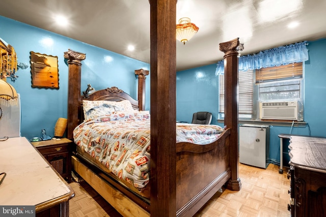 bedroom with cooling unit and decorative columns