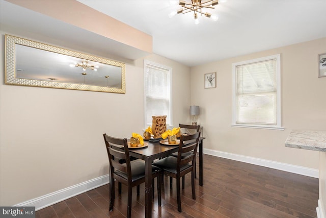 4548 Derby Manor Dr, Baltimore, MD 21215 - dining space with baseboards, an inviting chandelier, and dark wood-style flooring