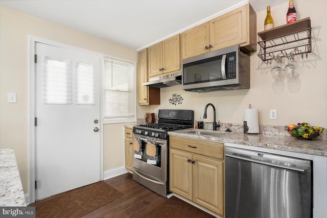 4548 Derby Manor Dr, Baltimore, MD 21215 - kitchen with appliances with stainless steel finishes, light brown cabinets, under cabinet range hood, and a sink