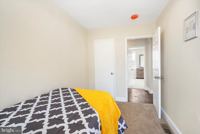 4548 Derby Manor Dr, Baltimore, MD 21215 - carpeted bedroom featuring visible vents and baseboards