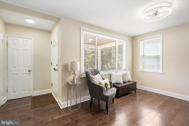 4548 Derby Manor Dr, Baltimore, MD 21215 - sitting room with baseboards and dark wood-type flooring