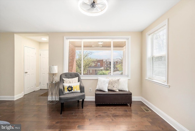 4548 Derby Manor Dr, Baltimore, MD 21215 - sitting room with wood finished floors, visible vents, and baseboards