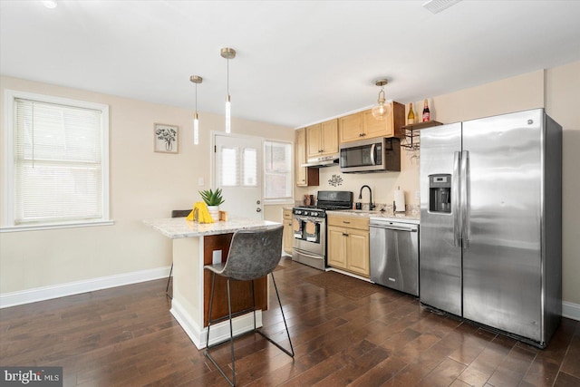 4548 Derby Manor Dr, Baltimore, MD 21215 - kitchen with stainless steel appliances, a center island, light brown cabinetry, a sink, and dark wood-style flooring