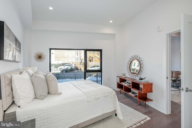 bedroom featuring recessed lighting, wood finished floors, baseboards, and access to outside