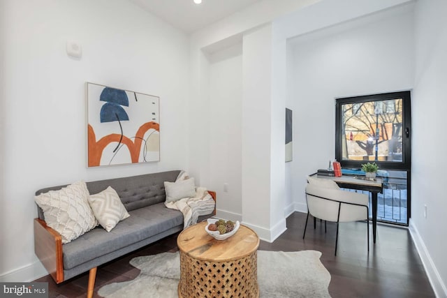 living area with recessed lighting, baseboards, wood finished floors, and plenty of natural light