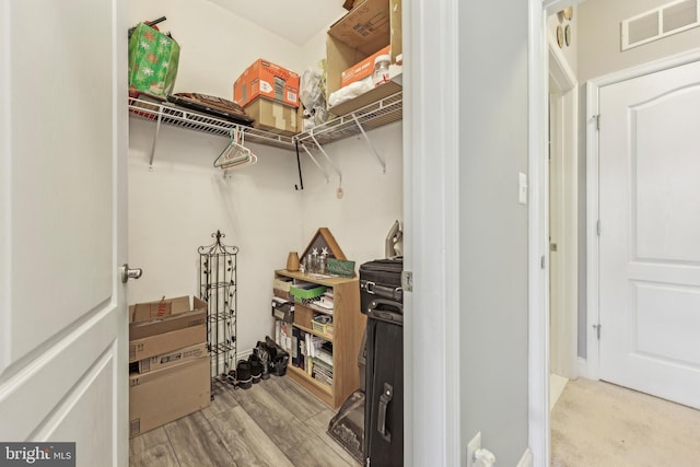 9200 Charleston Dr Unit 408, Manassas, VA 20110 - walk in closet featuring wood finished floors