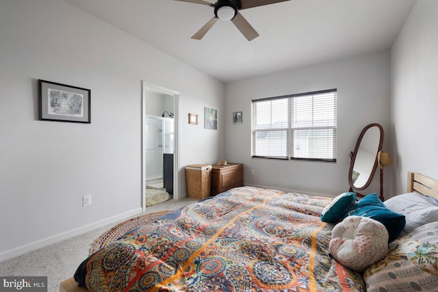 bedroom with carpet floors, a ceiling fan, baseboards, and connected bathroom