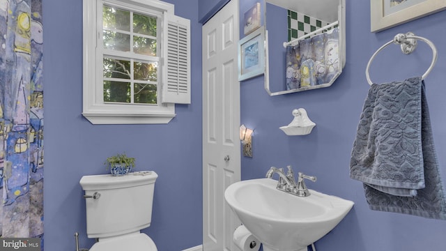 501 Tulip Rd, Riva, MD 21140 - bathroom featuring a sink and a shower with shower curtain