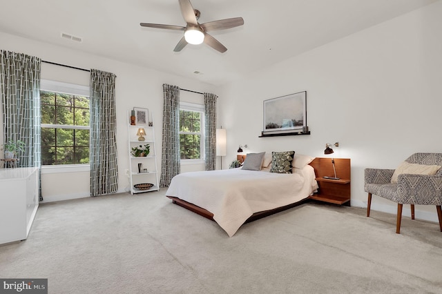 bedroom featuring carpet, baseboards, and ceiling fan