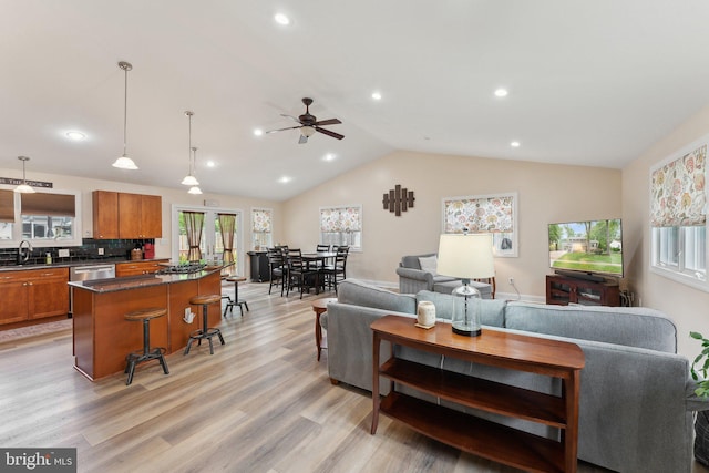 8807 Falkstone Ln, Alexandria, VA 22309 - living room featuring light wood finished floors, vaulted ceiling, ceiling fan, and recessed lighting