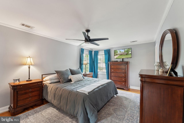 8807 Falkstone Ln, Alexandria, VA 22309 - bedroom with visible vents, wood finished floors, baseboards, and ornamental molding