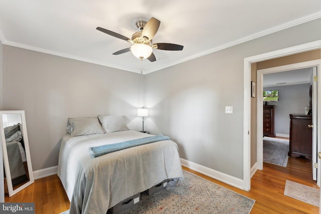 8807 Falkstone Ln, Alexandria, VA 22309 - bedroom with wood finished floors, baseboards, ornamental molding, and ceiling fan